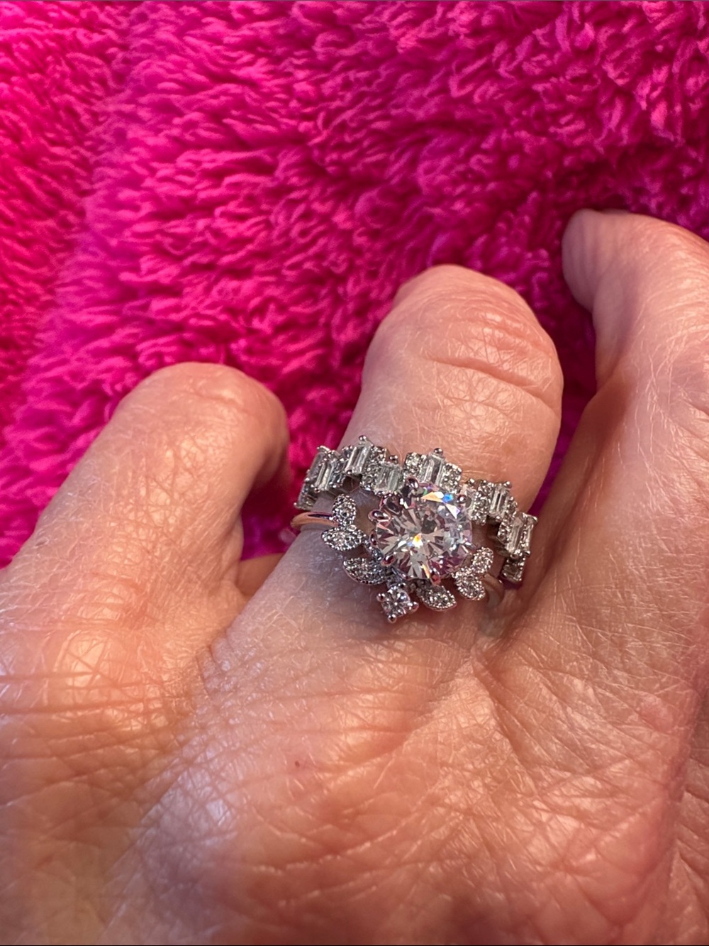 Silver Rings with white Cubic Zirconia stones. Both fit well together
So Pretty! - Picture 10 of 12